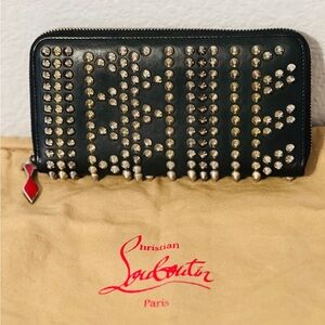 Authentic Christian Louboutin studded wallet with dust bag